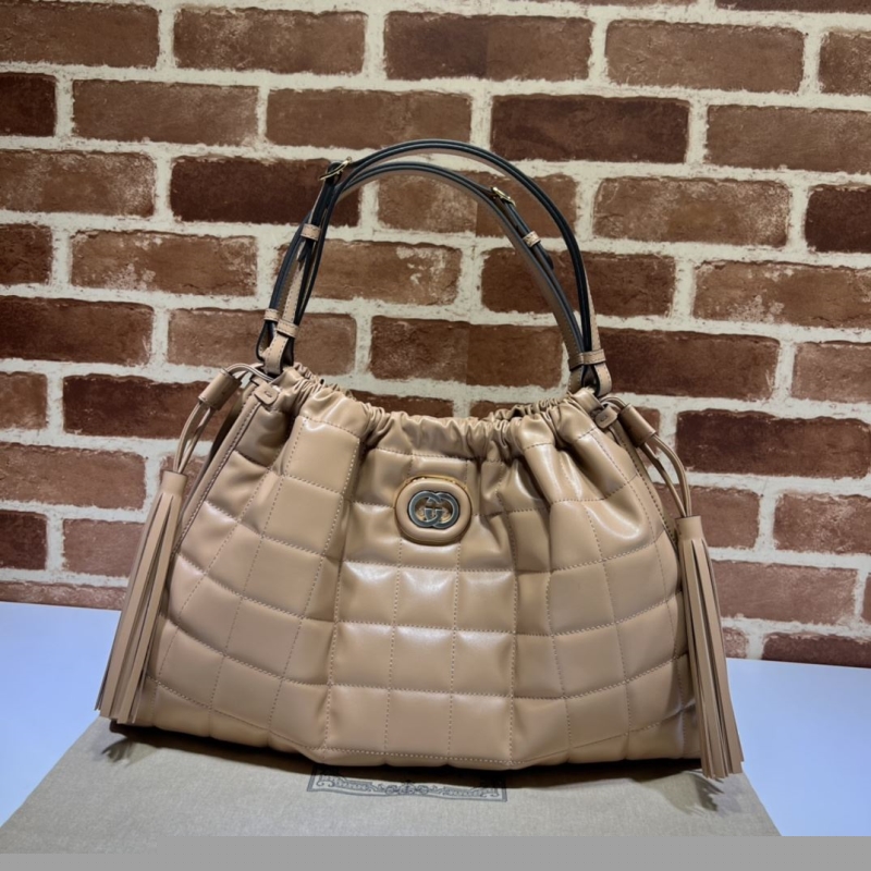 G*u*i top handle bags